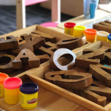 Wooden blocks and PlayDoh in children's play room